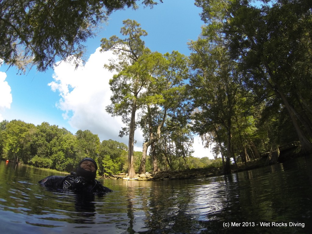 Michael relaxes in the Devil's Eye basin after a day of cave diving at Ginnie Springs